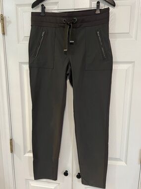 Athleta stretch pants, leggings. Size 12. zip pockets. Dark olive green